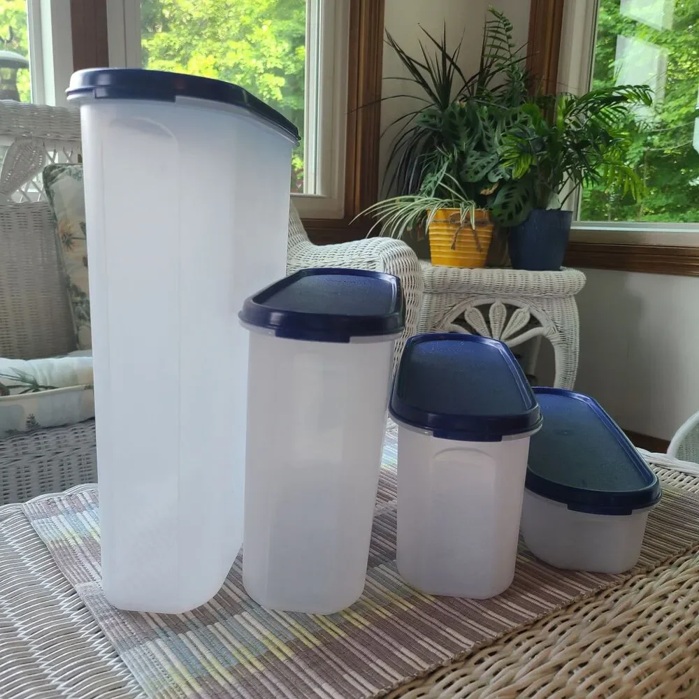 Vintage Tupperware Modular Mates Super Oval Pantry Set Four Piece Set Blue Lids